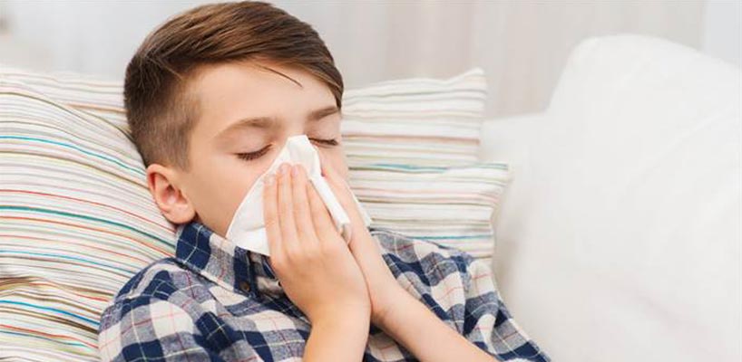 Dreng med forkølelse