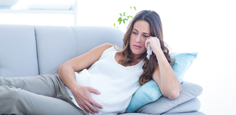 gravid kvinde der er ked af det