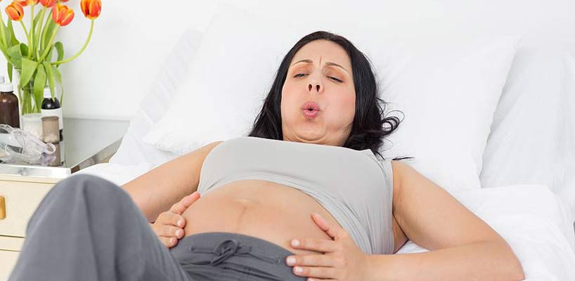 gravid kvinde i smerter